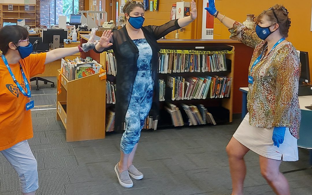 Library Workers Mask Up!